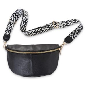 Sac bandoulière noir moderne avec sangle géométrique noir et blanc et finitions dorées élégantes.